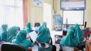 OBRAS KAIN PKK dengan tema Evaluasi Program TP PKK Tahun 2021